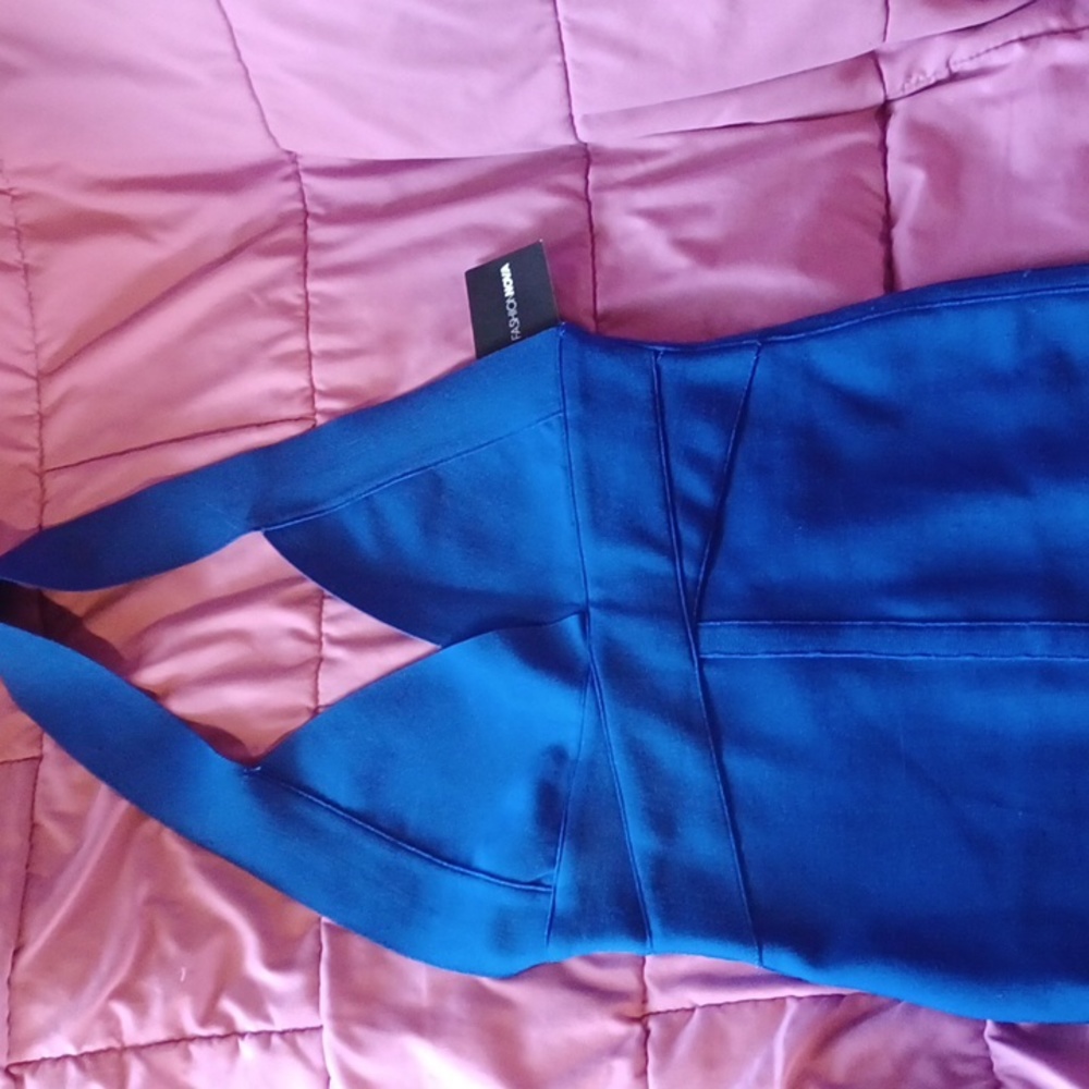 Fashion nova NWT blue cut out dress. SIZE MED.